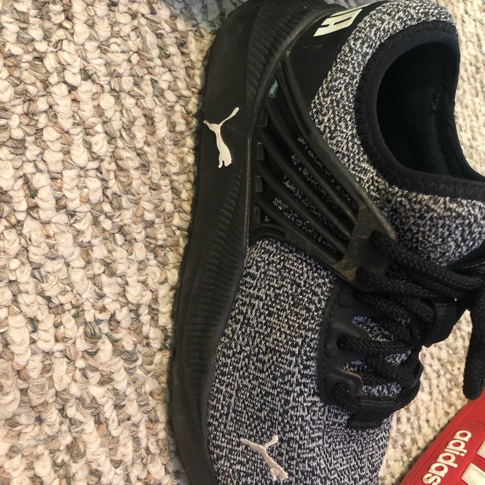 Barely used kids Puma tennis shoes.